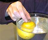 Lemon and coin in water